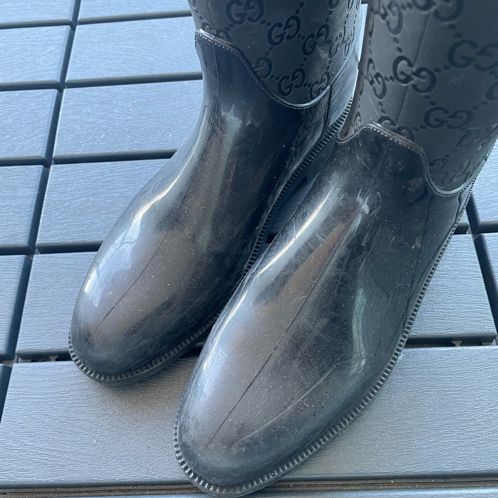 Gucci womens rubber GG monogramed knee high boots